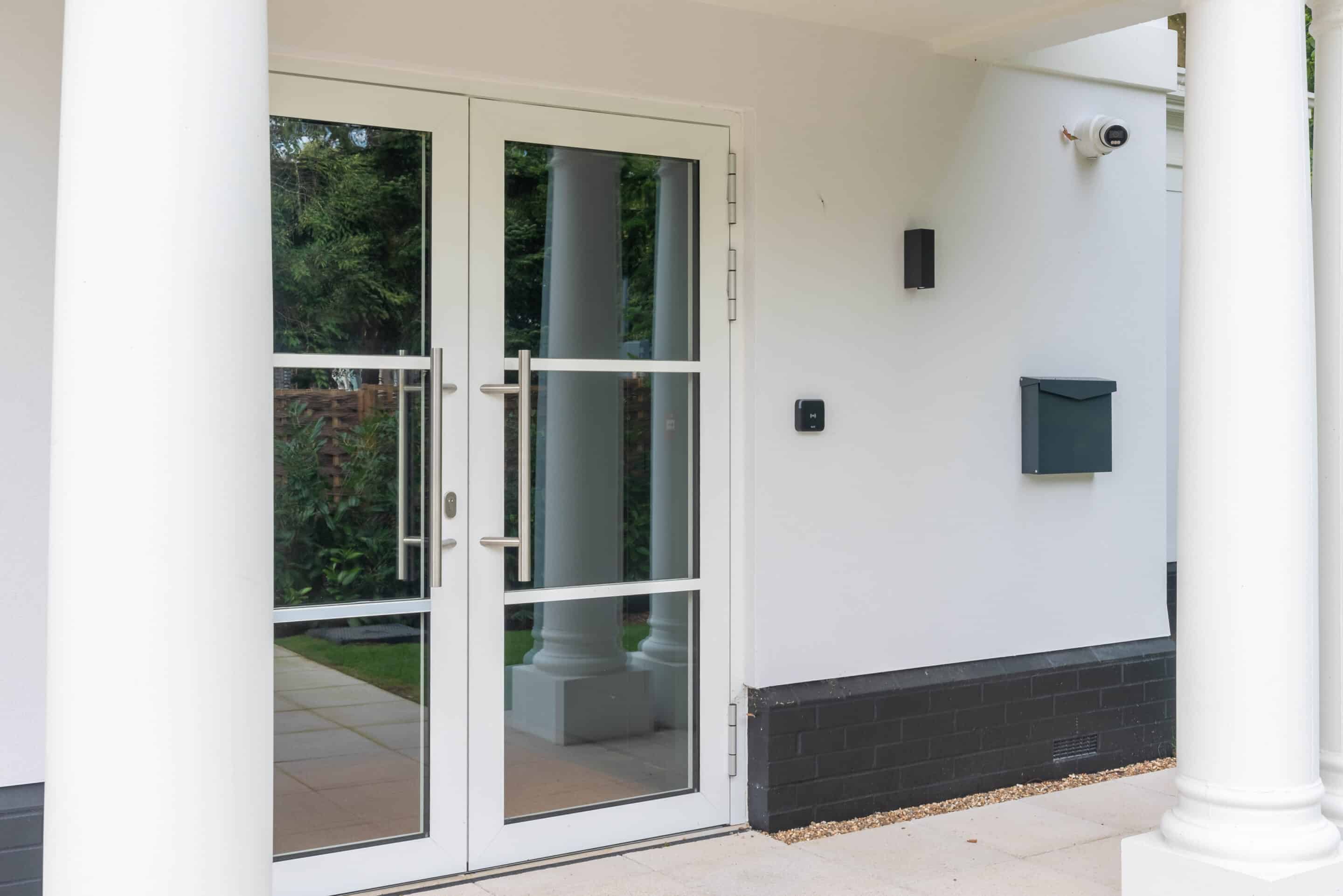Gatehouse elevation with Heritage uPVC windows and natural light interplay