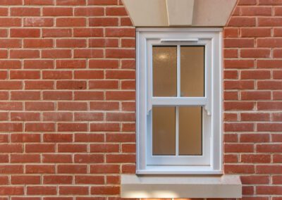 uPVC sash windows, upper floor detail new-build property