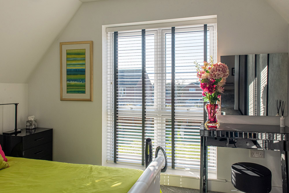 White casement window with blinds in bedroom, Windows Etc Essex