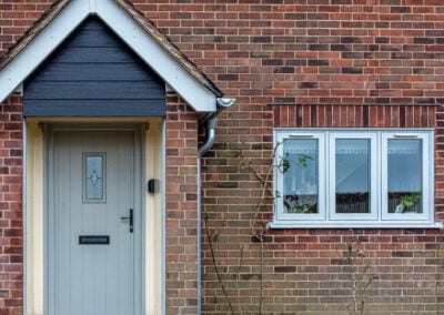 Cream composite front door and casement window, Windows Etc Essex