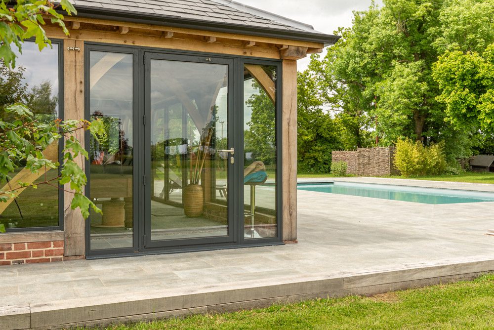 Smarts aluminium fixed windows on pool house elevation