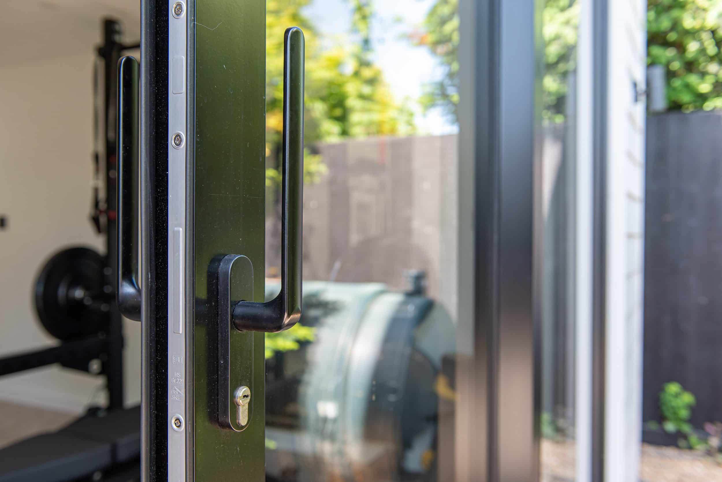RAL 9005 matt black aluminium frames on converted garage building