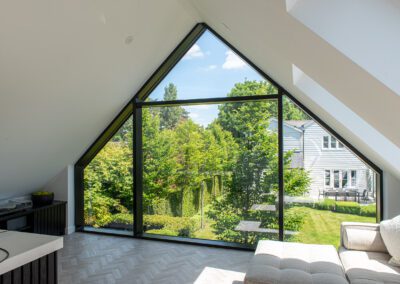 Aluminium lift and slide doors on converted garage, exterior detail