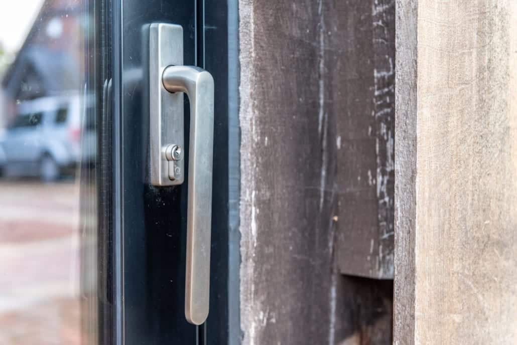 Smarts Heritage sink window without glazing bars in converted barn kitchen area