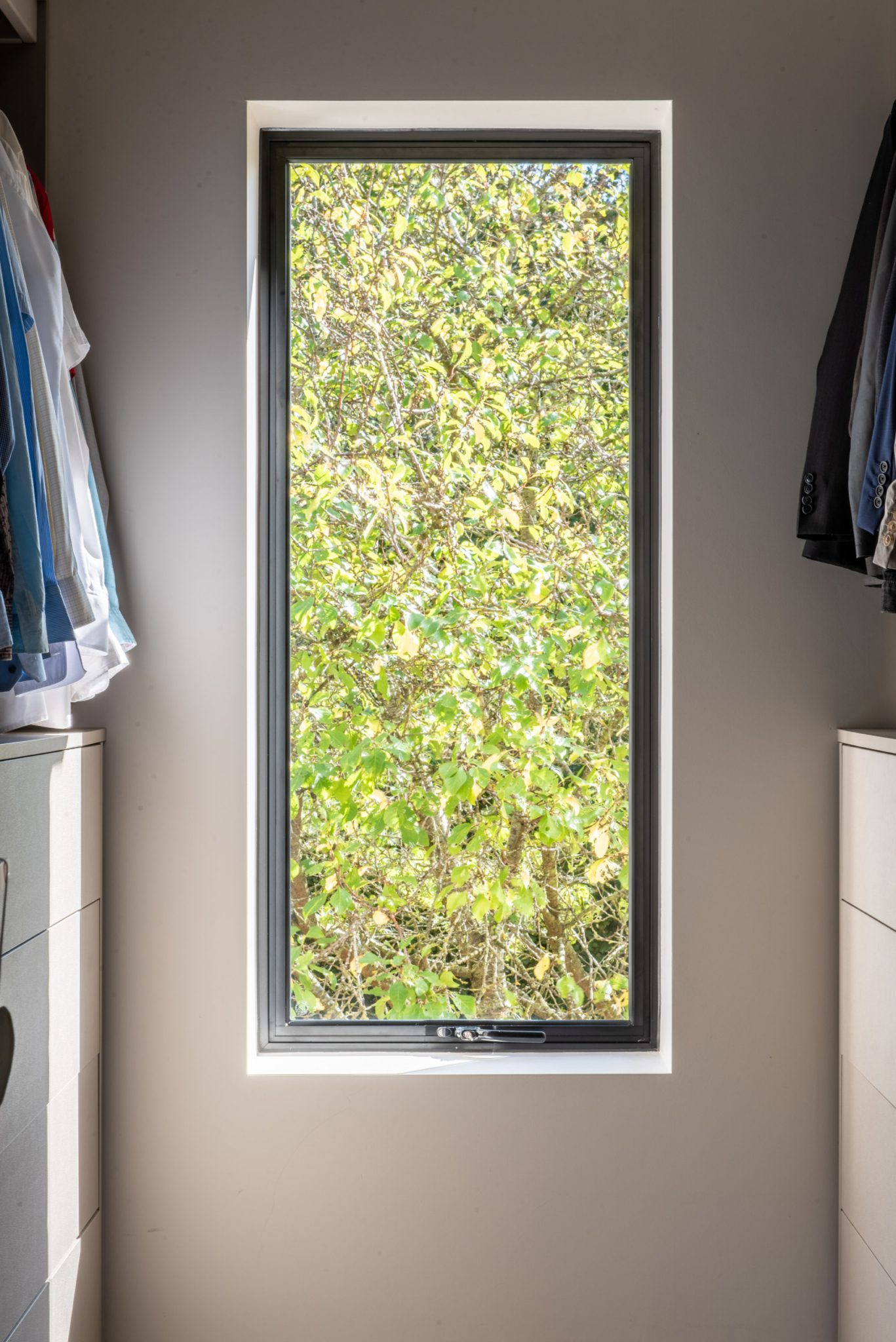 Full height view of the modern extension with buff brick and aluminium Heritage windows