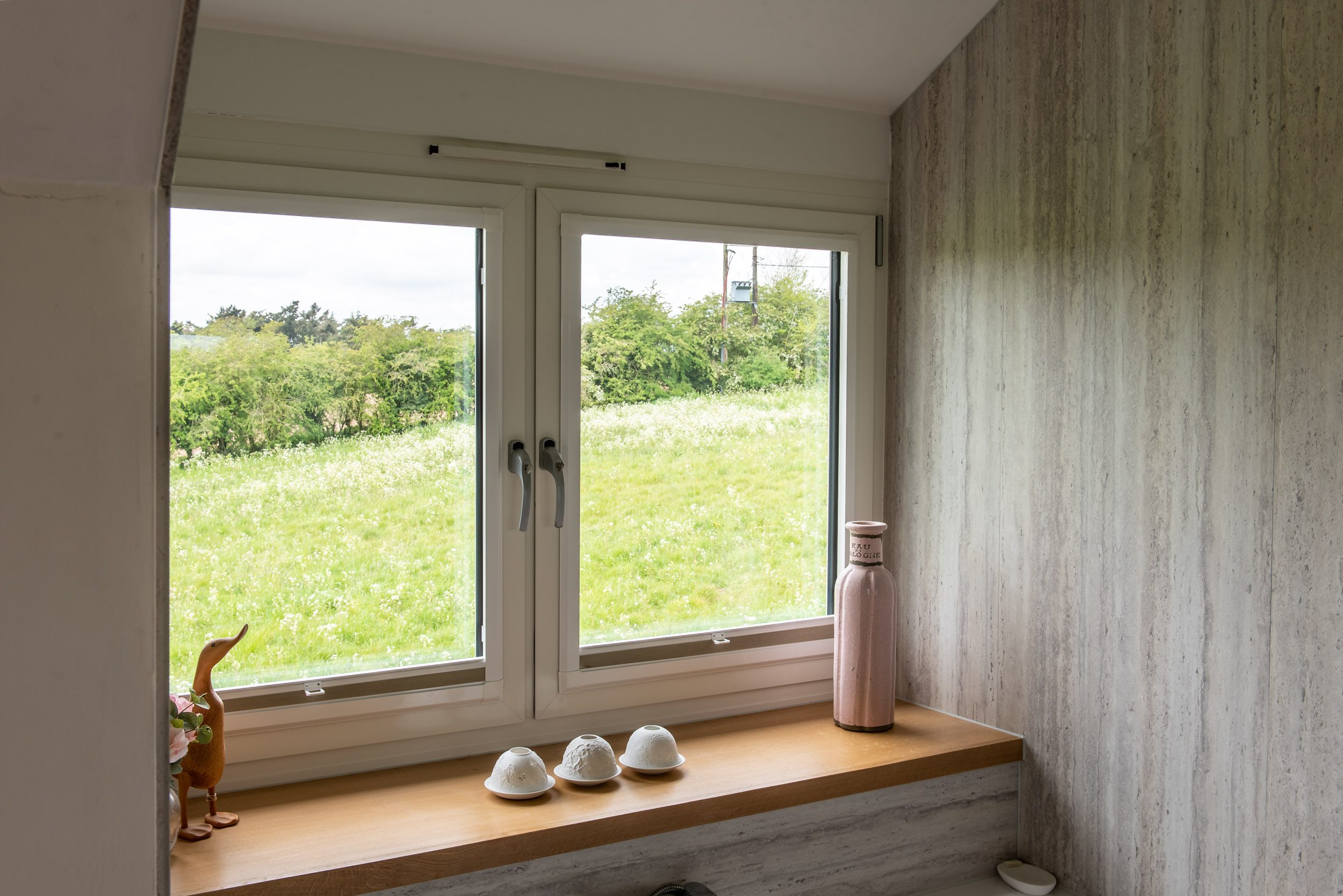 Detail of Smarts aluminium flush sash window in cream finish