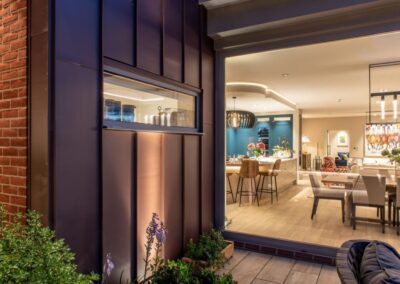 aïr perpendicular sliding doors enabling corner opening, Crowning Glory project