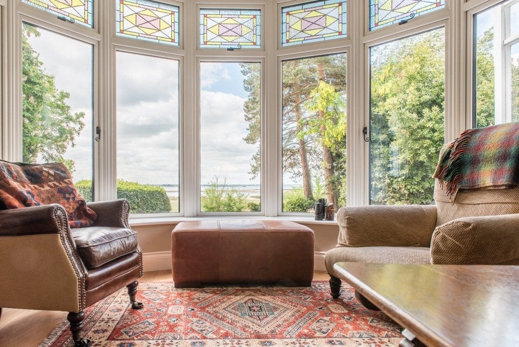 Bespoke bay window with leaded light replication on a coastal chalet
