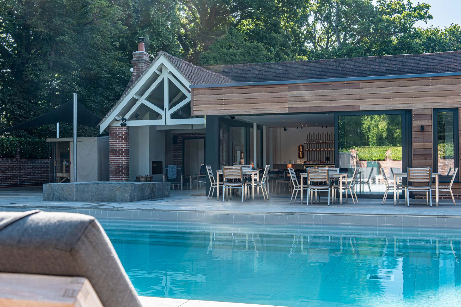 Commercial aluminium sliding doors at Maison Talbooth pool building