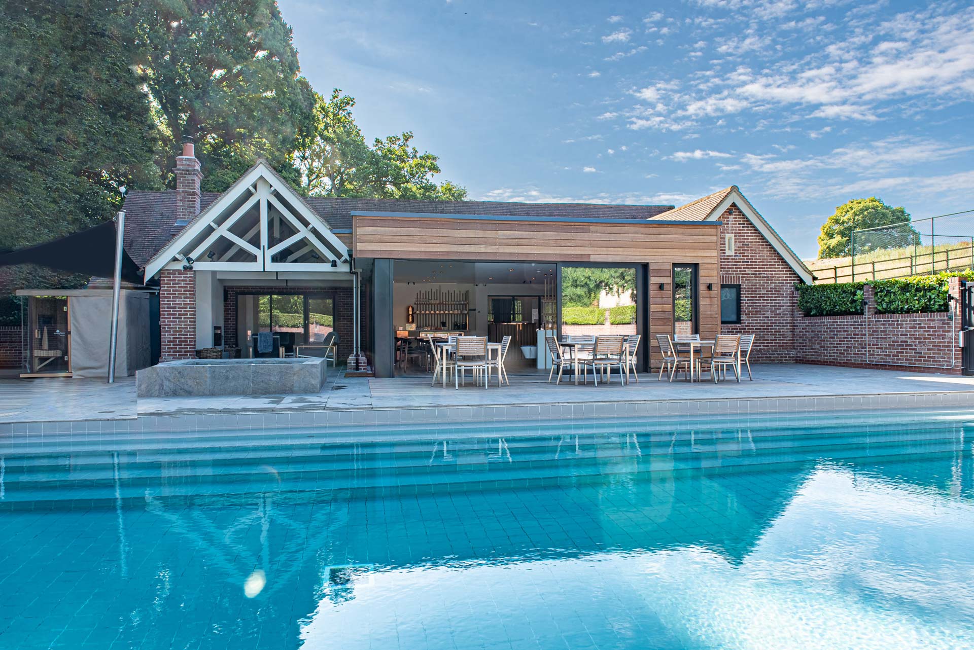 Interior view of the Maison Talbooth spa and pool building with aïr sliding doors