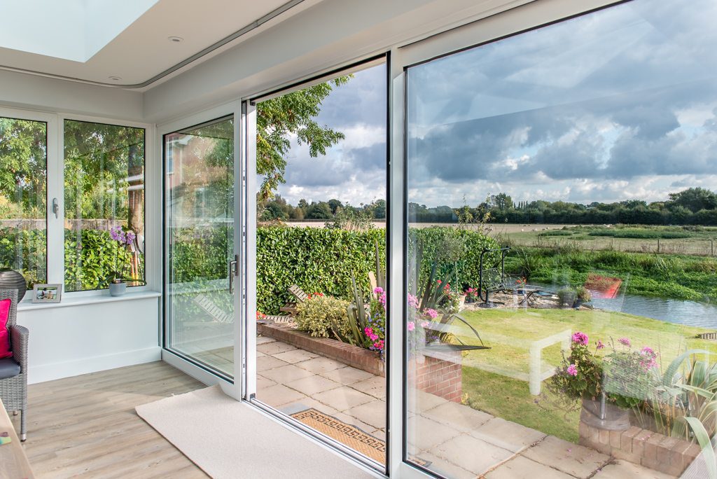 Sliding doors detail on the A Framed Landscape riverside chalet project