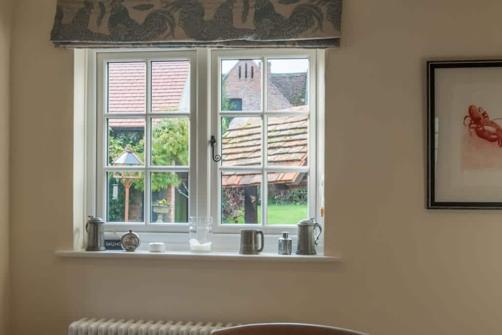 Traditional uPVC stormproof windows with deep cill, Essex rural property
