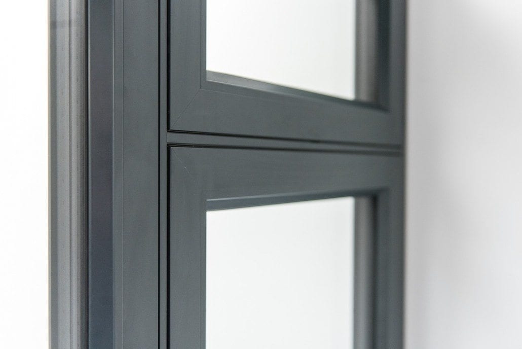 Close-up of an Origin aluminium front door panel and frame