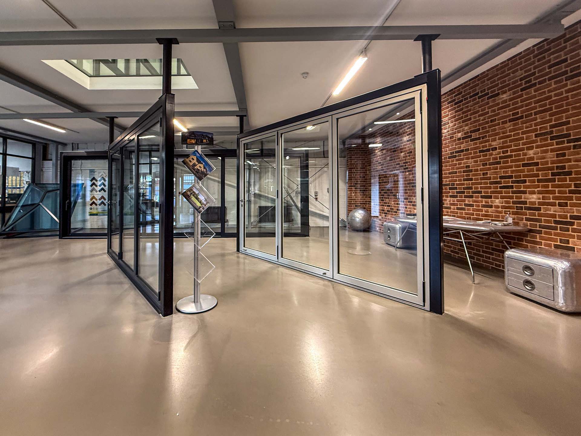 Aluminium bifold and sliding door display bays in the Windows Etc showroom, Colchester